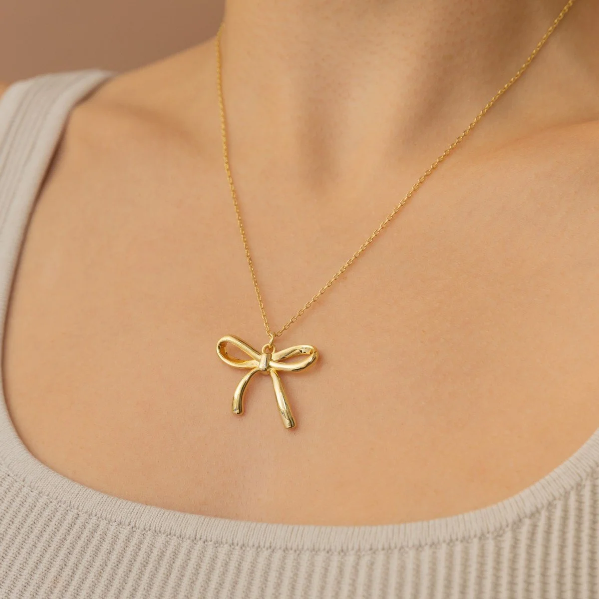 Bow-Necklace-in-14k-Gold-Plated-2.jpg