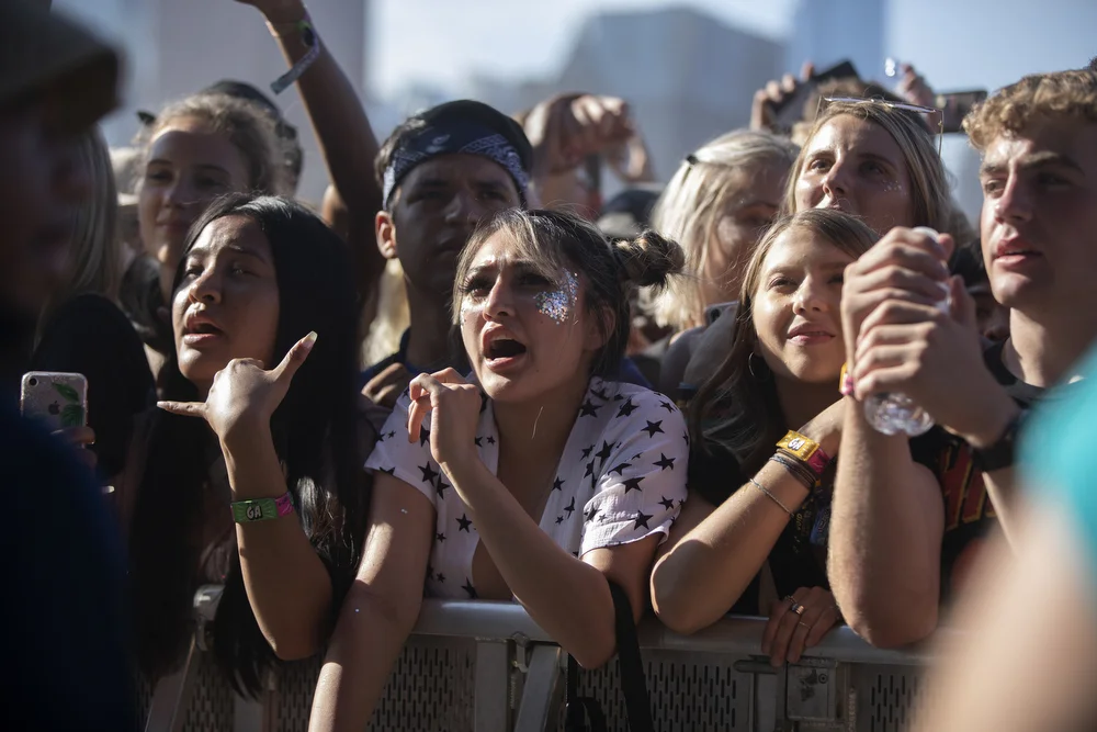Fans watch 21 Savage perform at Lollapalooza Friday, August 2, 2019, in Chicago. (Erin Hooley/Chicago Tribune)