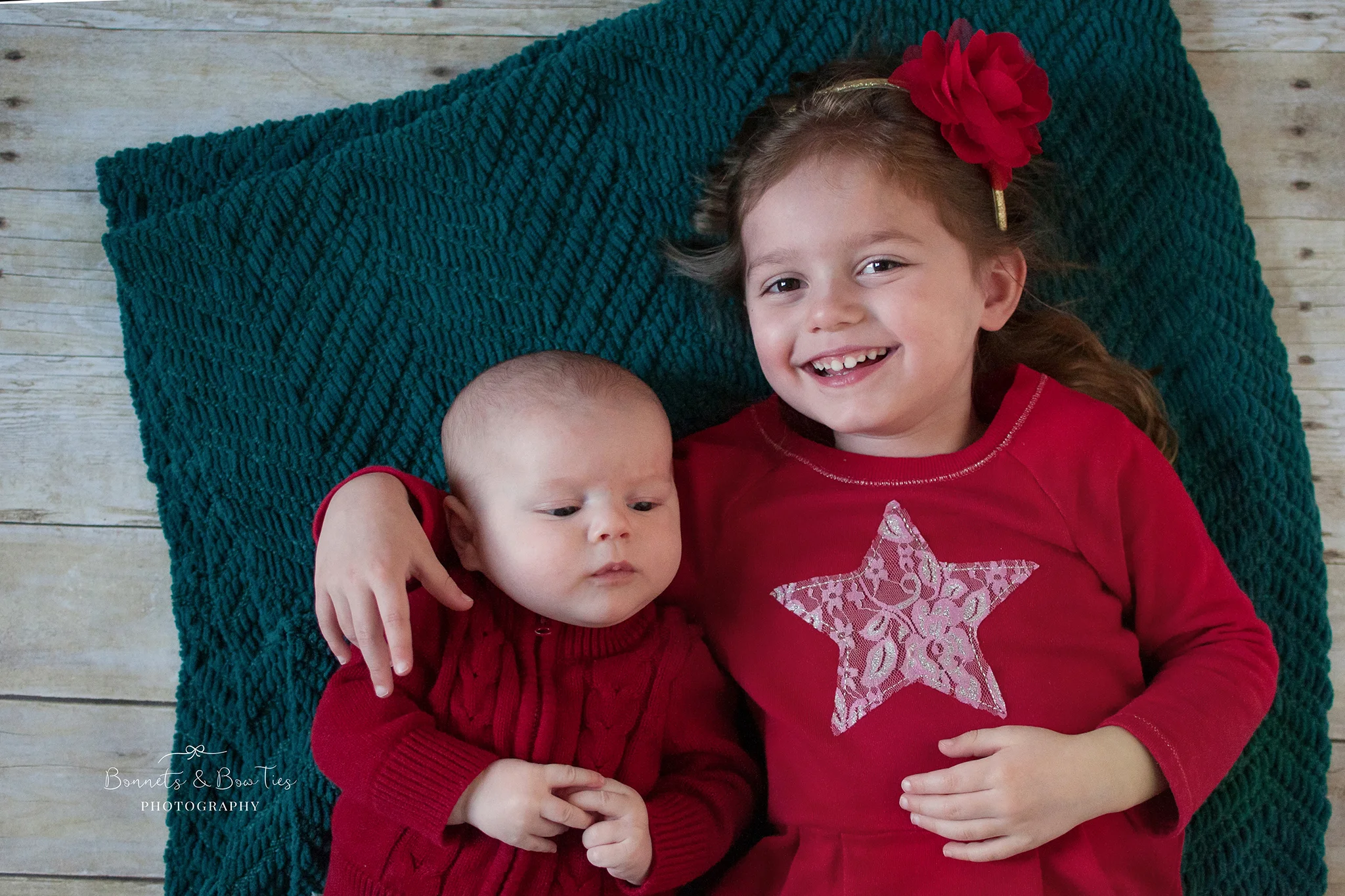 newborn sibling photo shoot.jpg