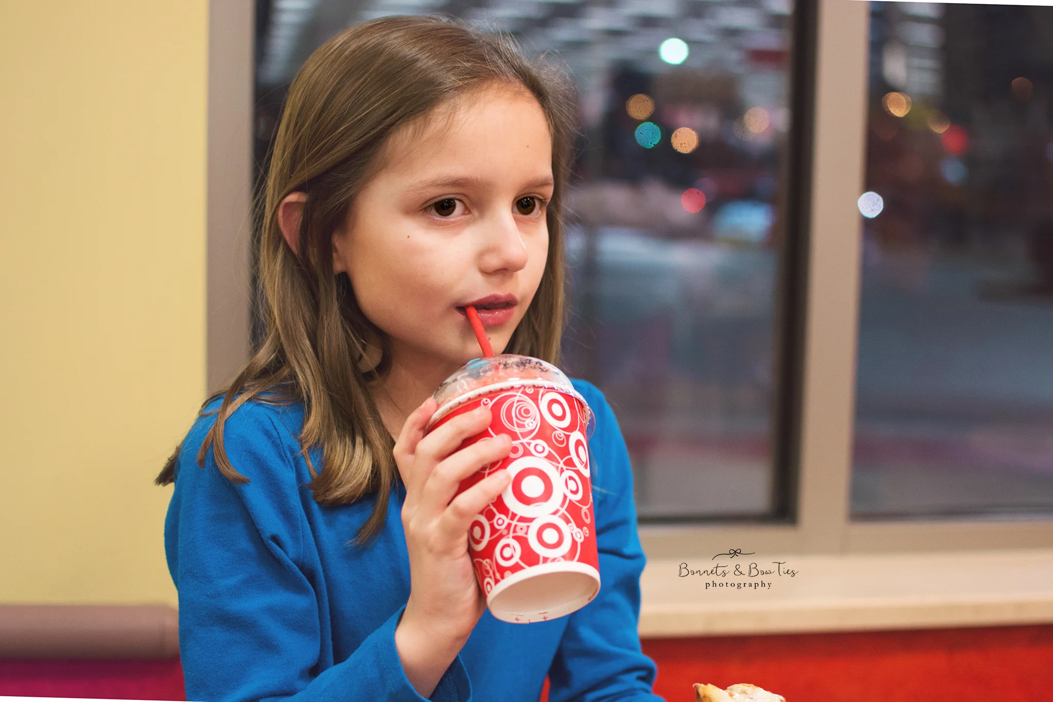 girl drinking soda at Target.jpg