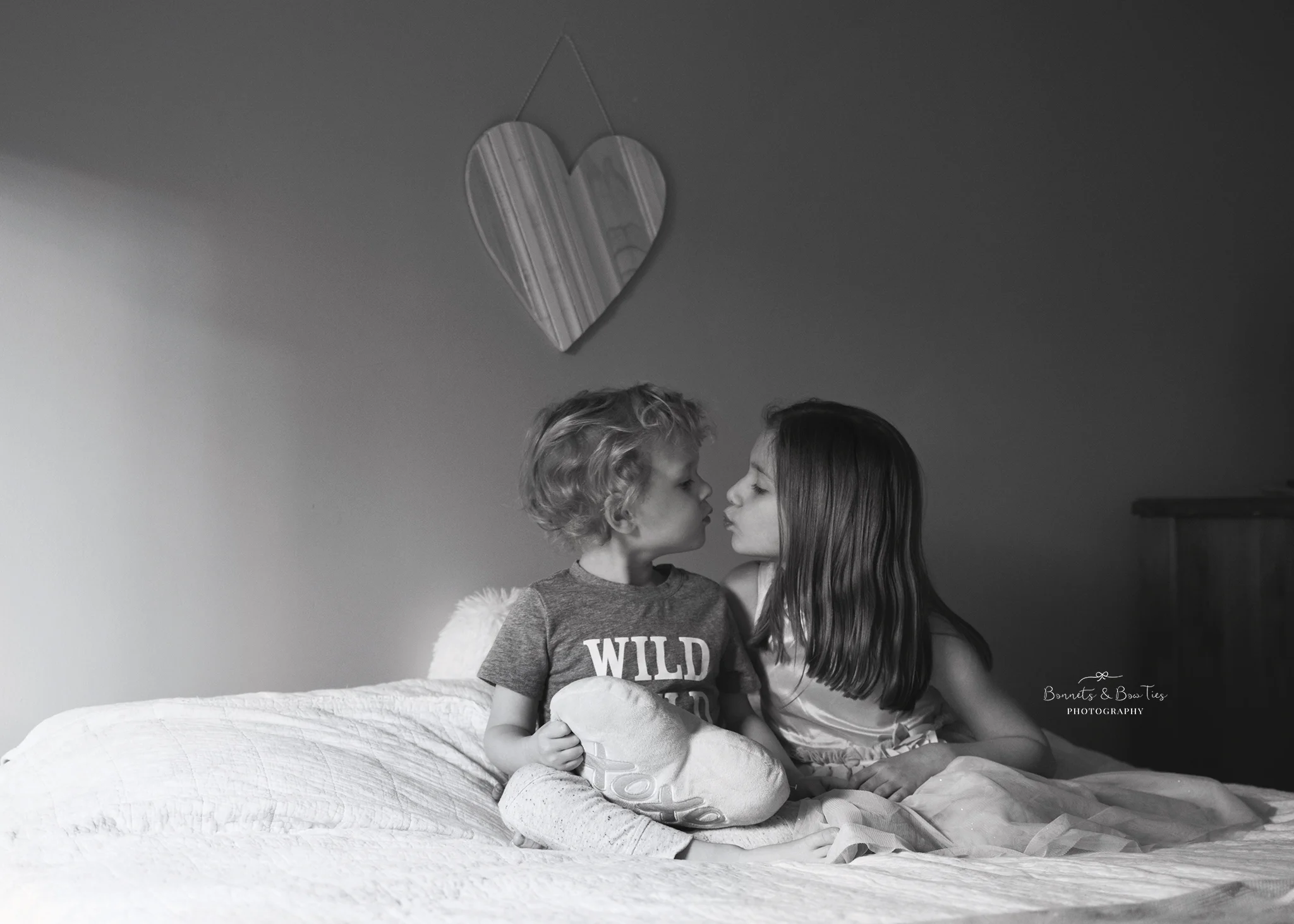 black and white sibling pose.jpg