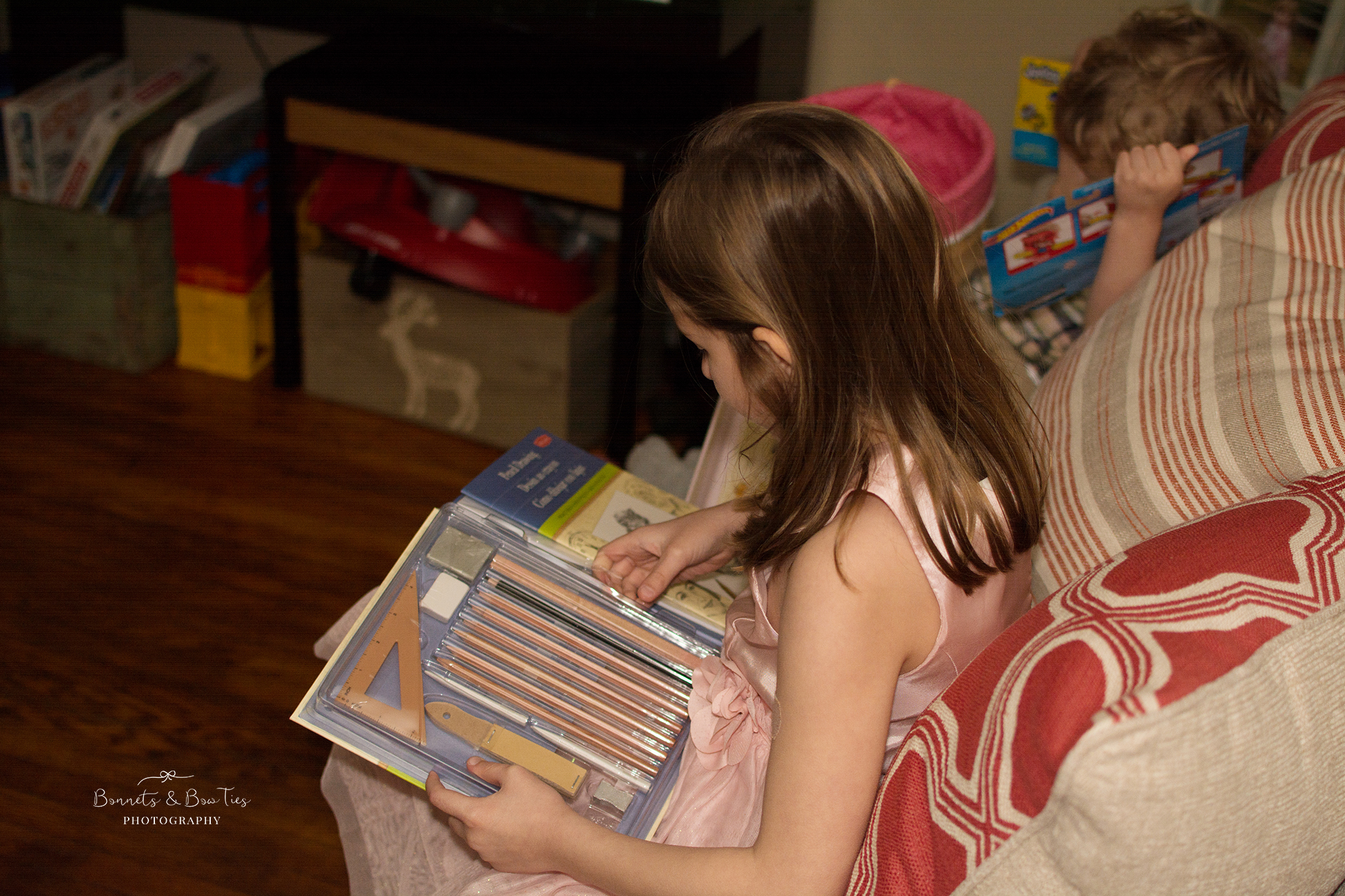 girl looking at easter gift.jpg