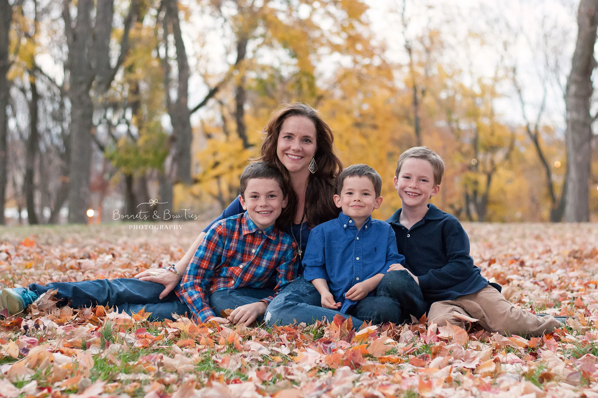 Mother posing with her three sons.jpg