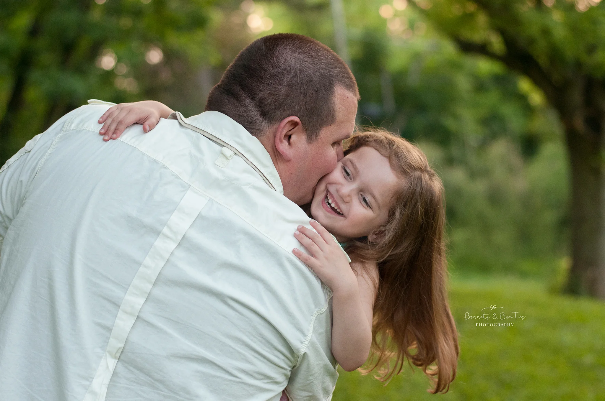 Father holding daughter.jpg