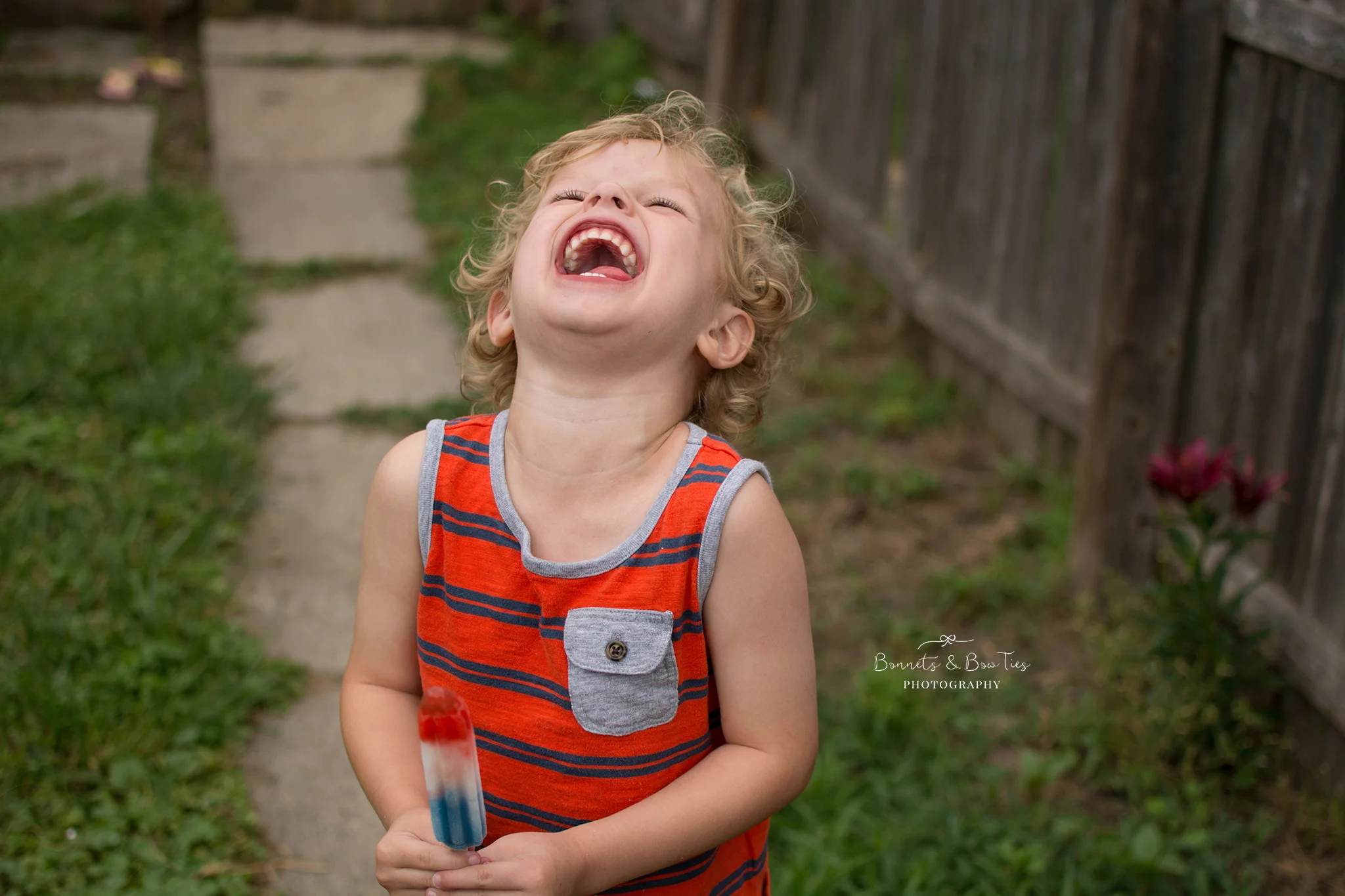 boy wearing red stripped tank top.jpg
