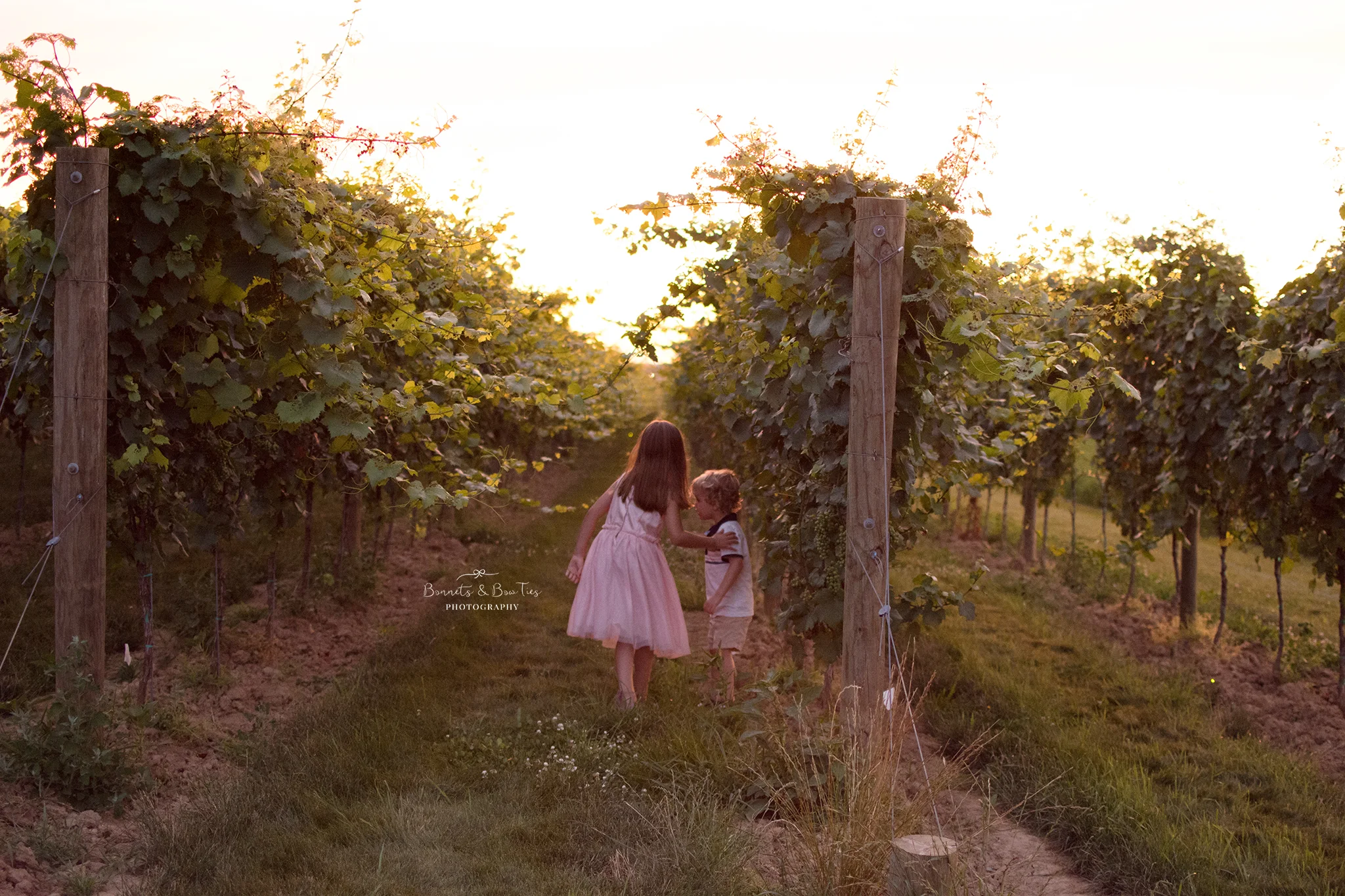 boy and girl playing in vineyard.jpg