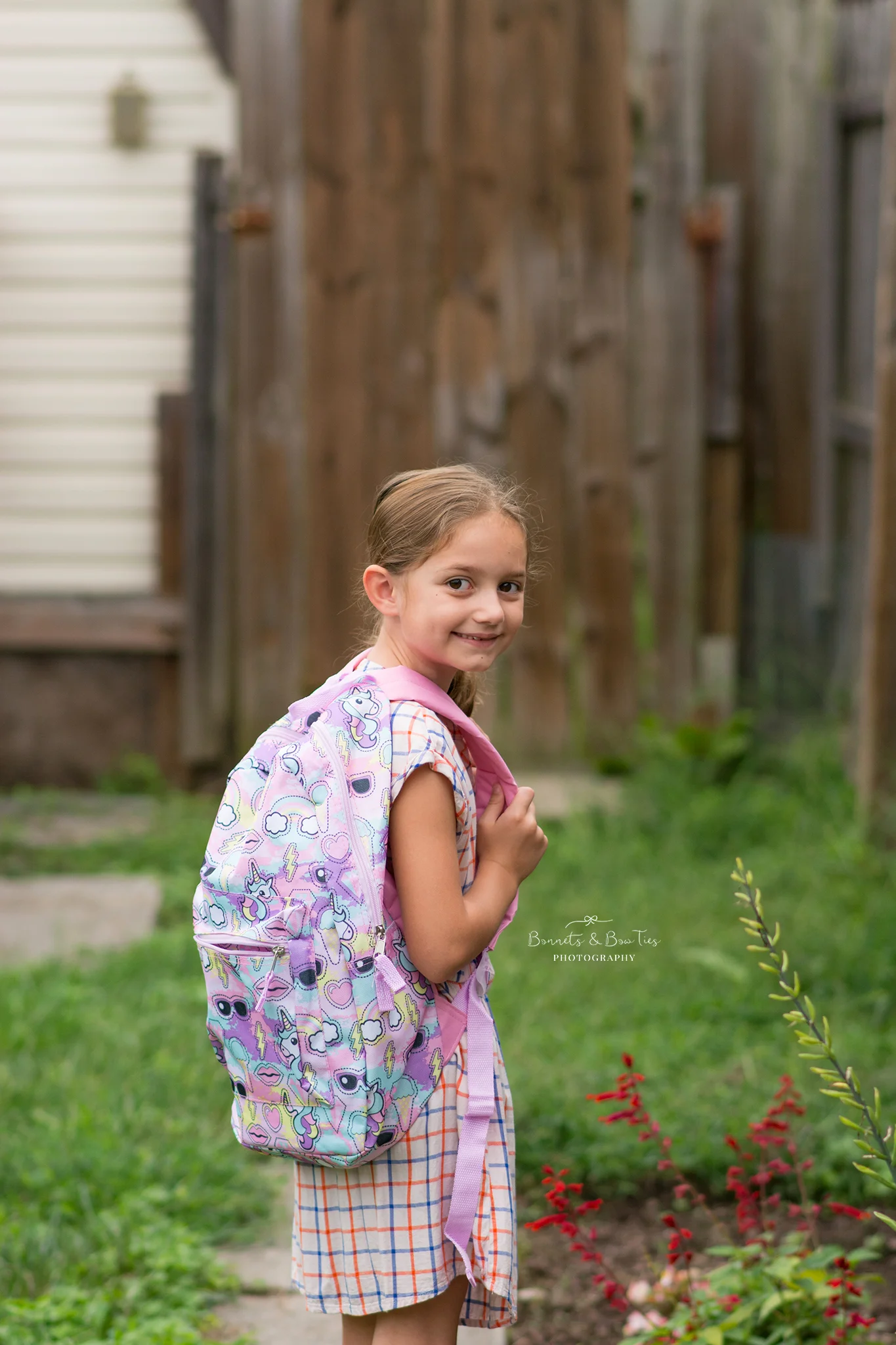 girl with purple backpack.jpg