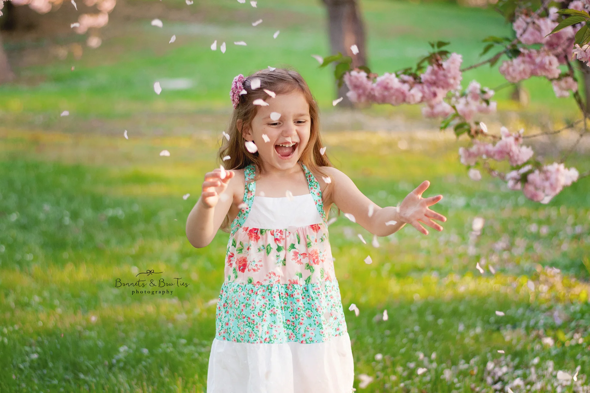girl playing in blossom trees.jpg