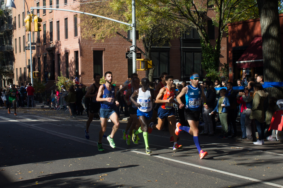 A group runs down Lafayette Street in Brooklyn.
