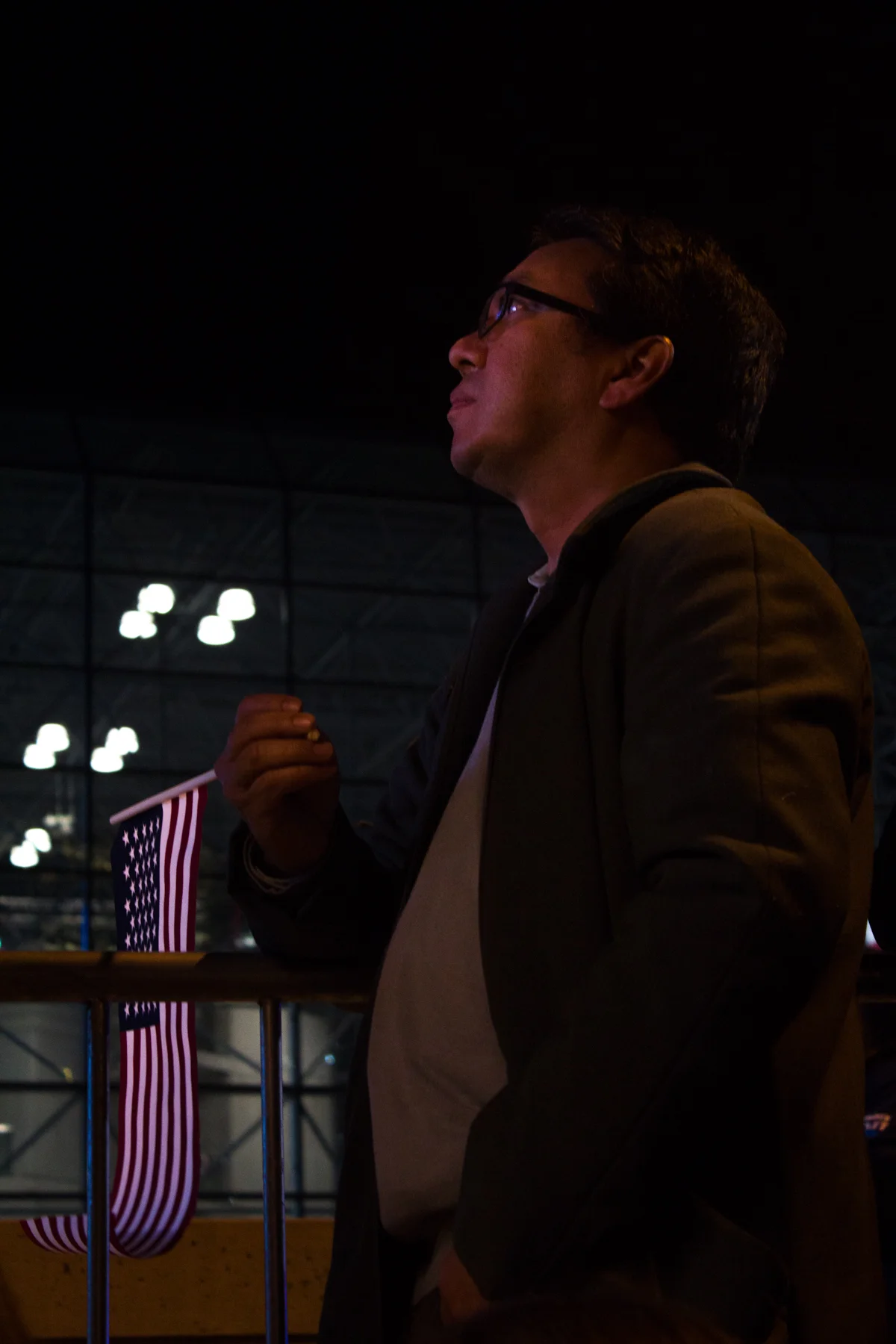 The crowd outside the Javits Center react as polls show Clinton floundering in key battleground states.