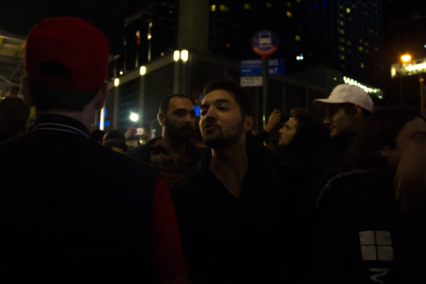 People react to Trump’s election near the New York Hilton shortly before Trump delivers his acceptance speech at the hotel.