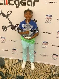 christian with award.jpg