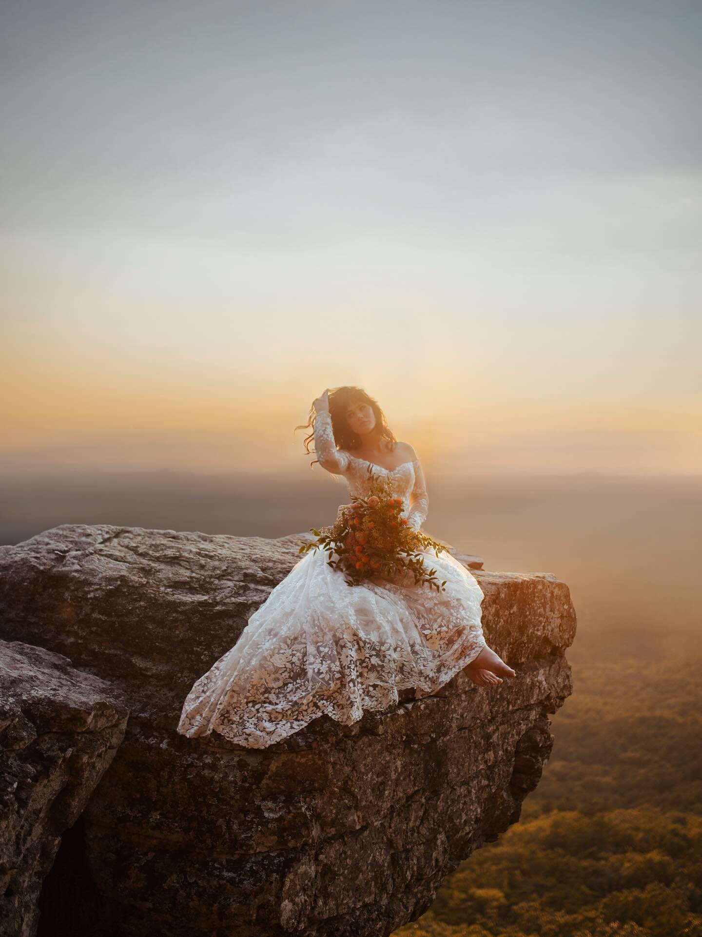 My jaw is on the floor. Last night we climbed to the highest point in AL and captured pure magic. ✨🌅 These two beautiful people knocked it out of the park, and I&rsquo;m sooooo obsessed!! 

Shoutout to @aw.bridal for the beautiful dress, and to @the