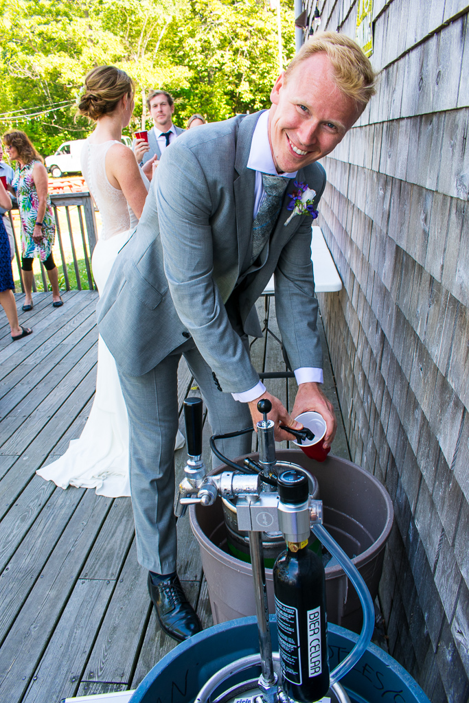 The groomsmen tapped the kegs