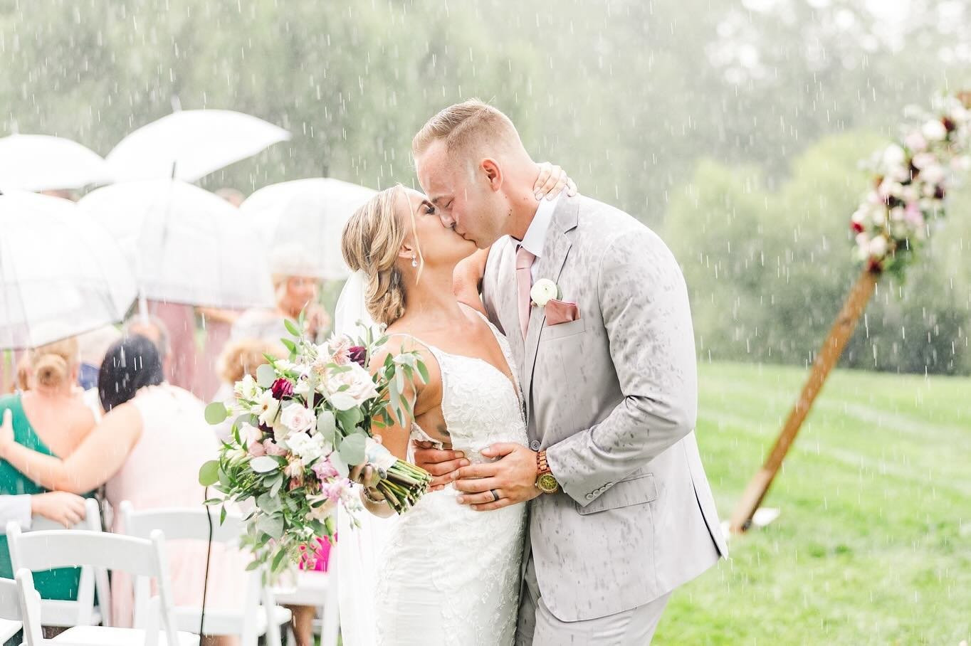 Just after Cirsten and David&rsquo;s wedding ceremony began, the skies began to darken and the threat of rain grew closer and closer.  Seconds before sharing their first kiss, it began to downpour!  These two are proof that rain on your wedding day i