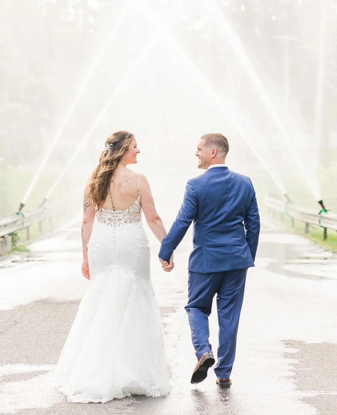 Pro Tip: If you have something that is unique to you as a couple, consider incorporating it into your wedding photos.  Elle and Brian volunteered at their local fire department, and I loved that they decided to take some of their newlywed portraits t