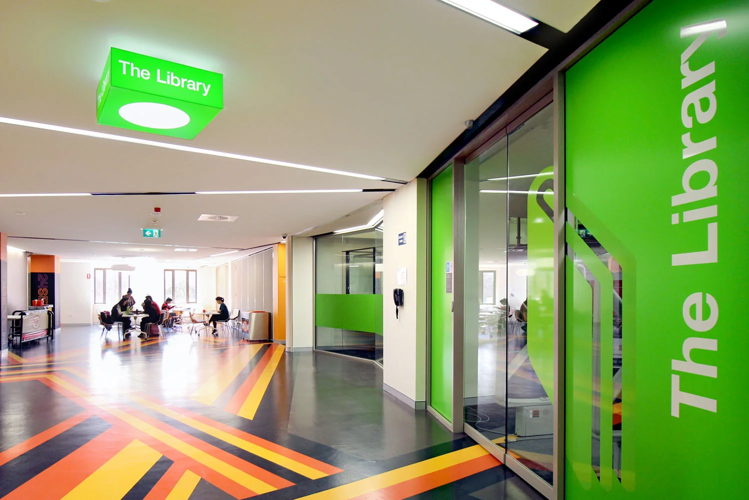 CSU, Wagga: We designed and made bespoke light fittings mounted on the ceiling to identify key areas in a crowded space.
