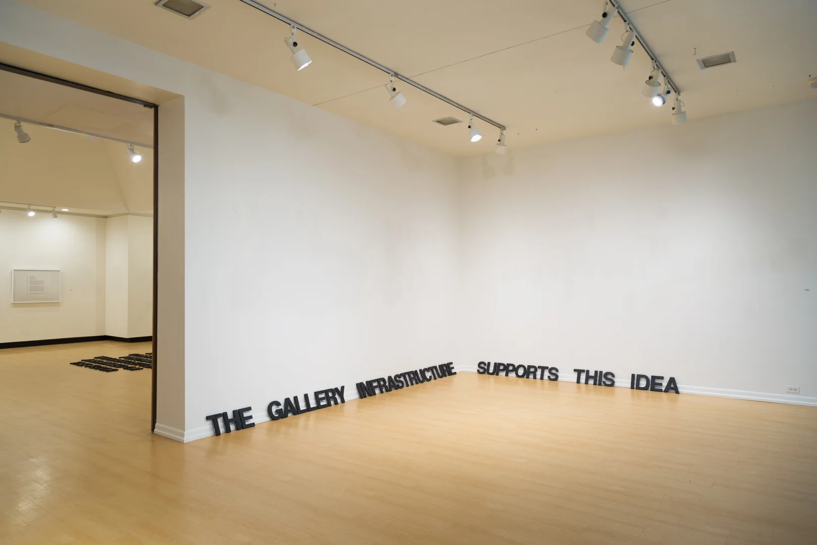 The Gallery Infrastructure Supports This Idea , 2019 Wood, India ink, and wax Size variable