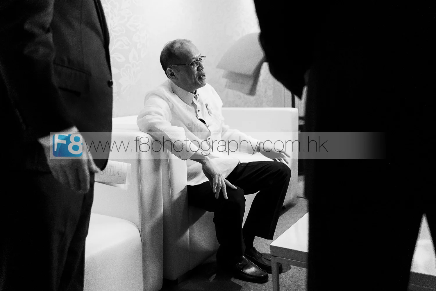 President Benigno S. Aquino III of the Philippines, backstage being briefed and surrounded by his bodyguards just before he officially opened the APEC 2015 Summit.