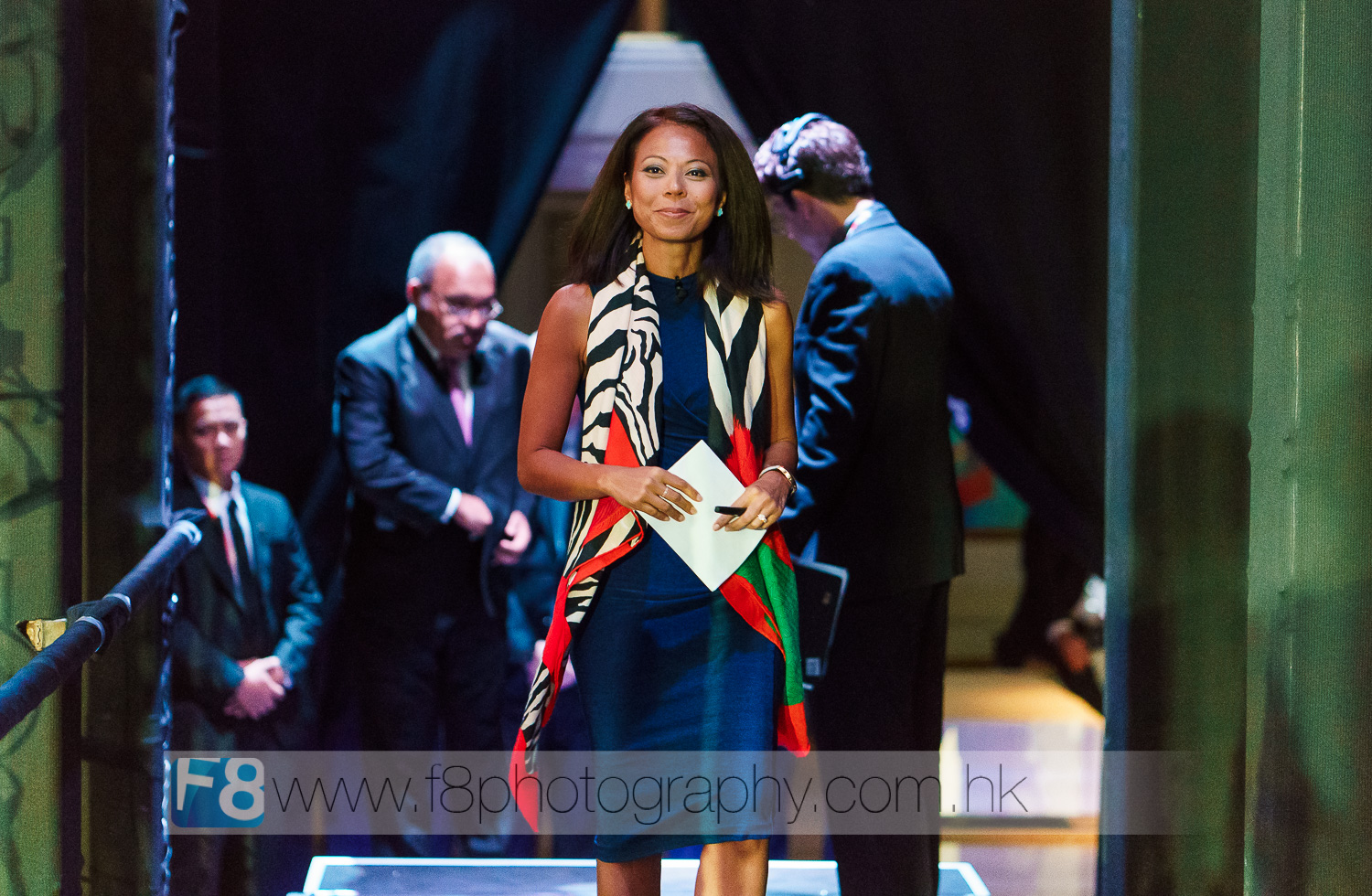 Haslinda Amin, News Correspondent and anchor for Bloomberg Television going on stage to interview the prime minister of papua new guinea.