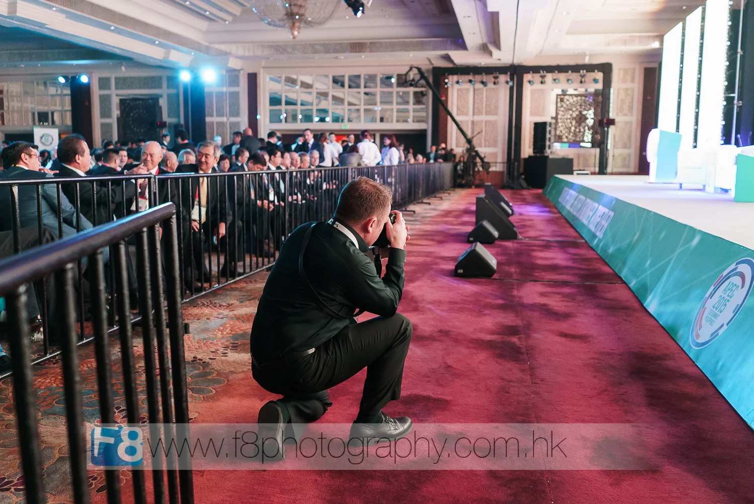 Myself in front of the stage checking gear before obama came on stage.  we were the only two photographers allowed access all areas during the event, hence being able to capture some unique viewpoints of the behind the scenes preparation, very …
