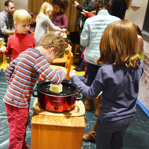 Candle dipping was a hit with young and old.