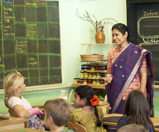 WSL parent Dee Bireddy tells 4th graders the story of Lord Rama and the festival of Diwali.