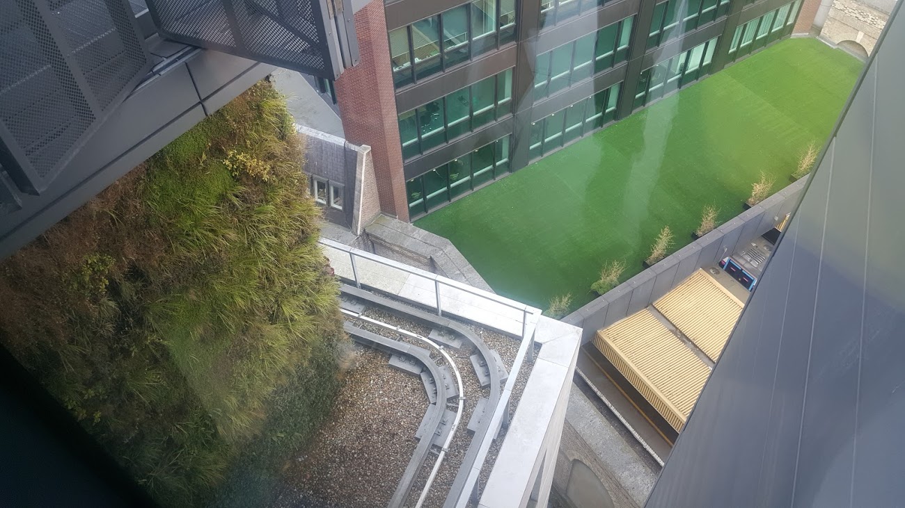 Frosts - Doubletree by Hilton, 7 Pepys St EC3N 4AF. Down on the terrace is an artifical lawn which doesn't fit with green architecture.