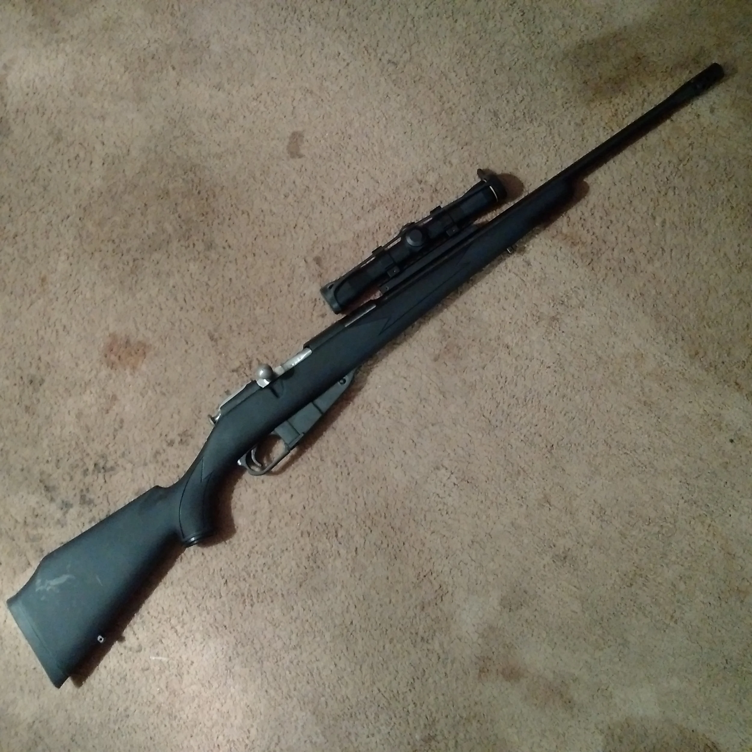 Customized Russian Nagant, custom scout mount for scope, synthetic stock, muzzle break, trigger job, recoil reducers. 