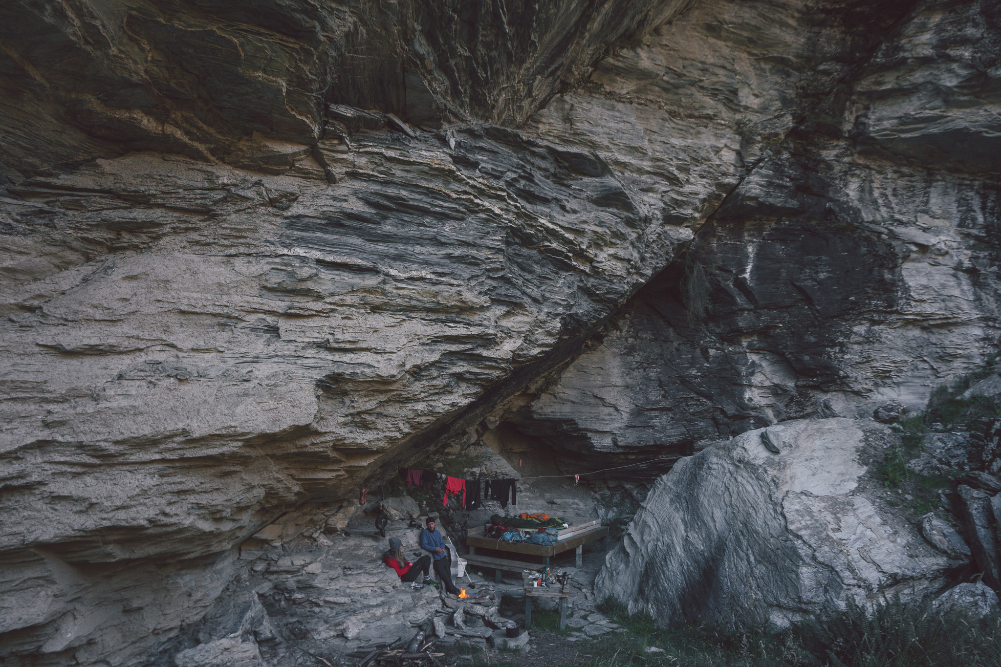 Setting up camp in the earnslaw burn rock bivvy