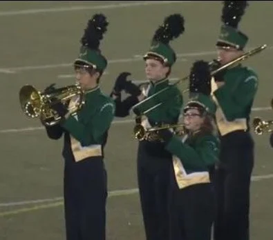 I wonder if this guy thought no one would notice if he didn't bring his trumpet?