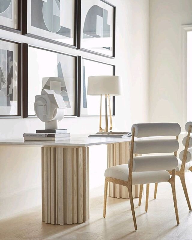 With pedestals #inspired by the inner workings of a handmade wristwatch, the Huxley Dining Table is available in your choice of a rectangle or oval top. Also featuring the Lucca Chair in textured Bronze, both from the new Baker Luxe Collection and th