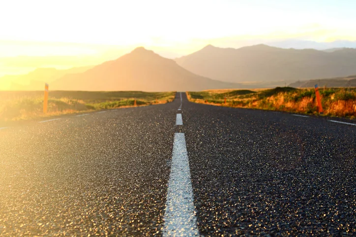 View of a road heading into the sunset