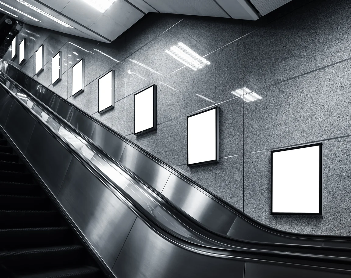 Advertising opportunities next to a subway station escalator