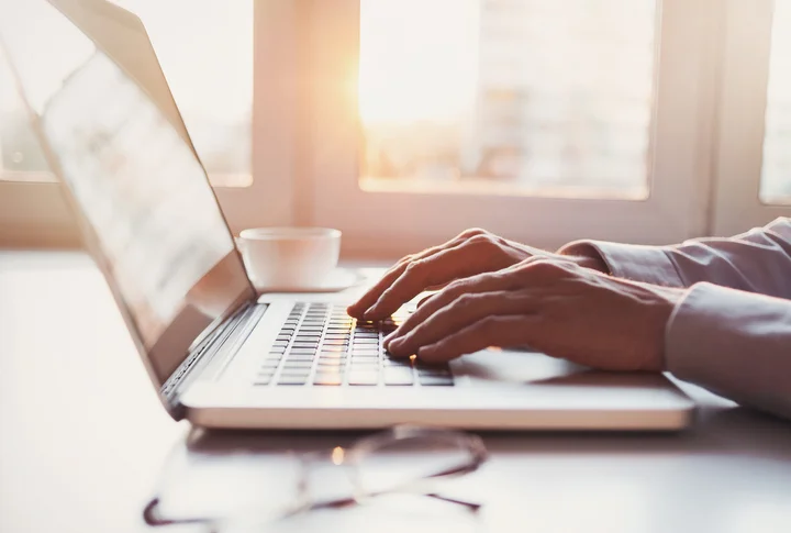 Place-of-work-man-using-laptop-computer.jpg