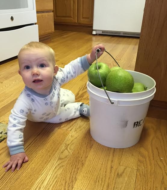 Hazel says, "These Granny Smith sure are good! Let's go pick some more Mom!"