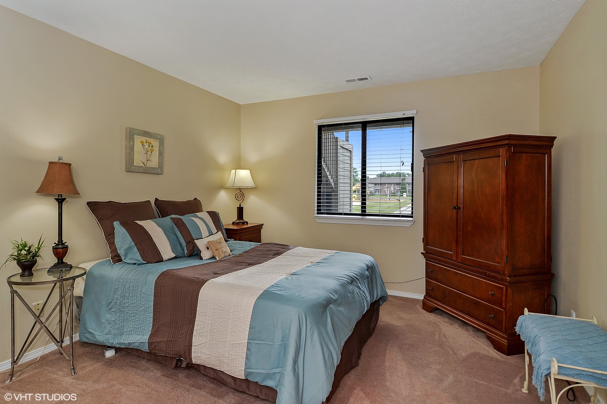 14_1135SuncrestCir_14_MasterBedroom_HiRes.jpg