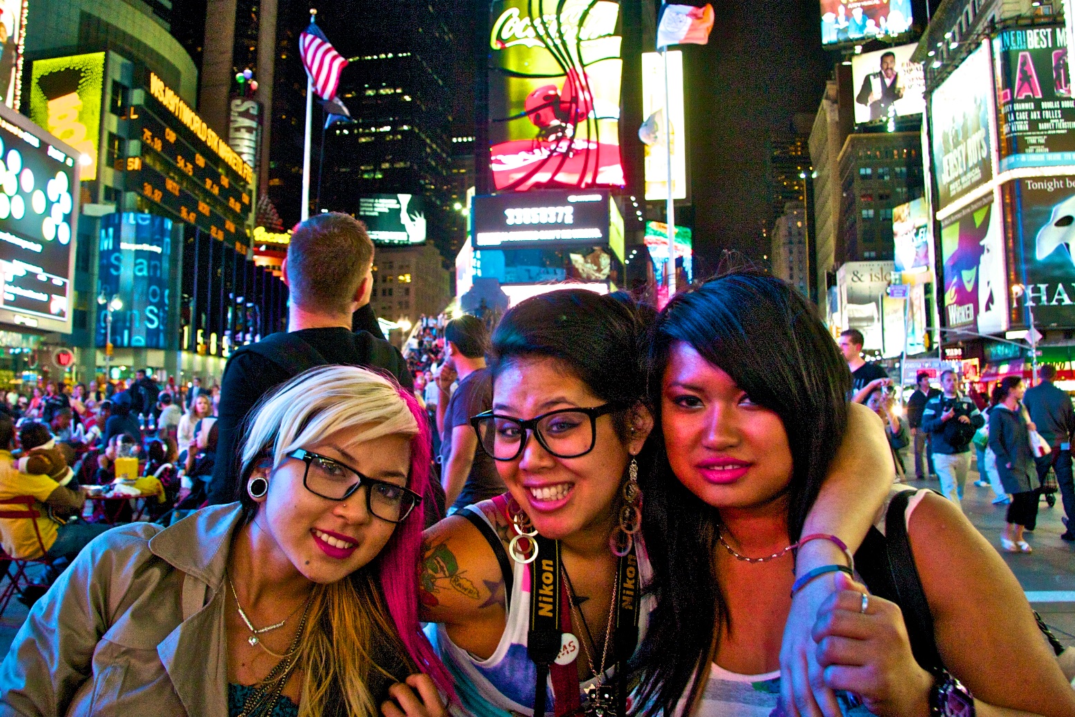 Times Square cross-culture friendship. New York, USA.