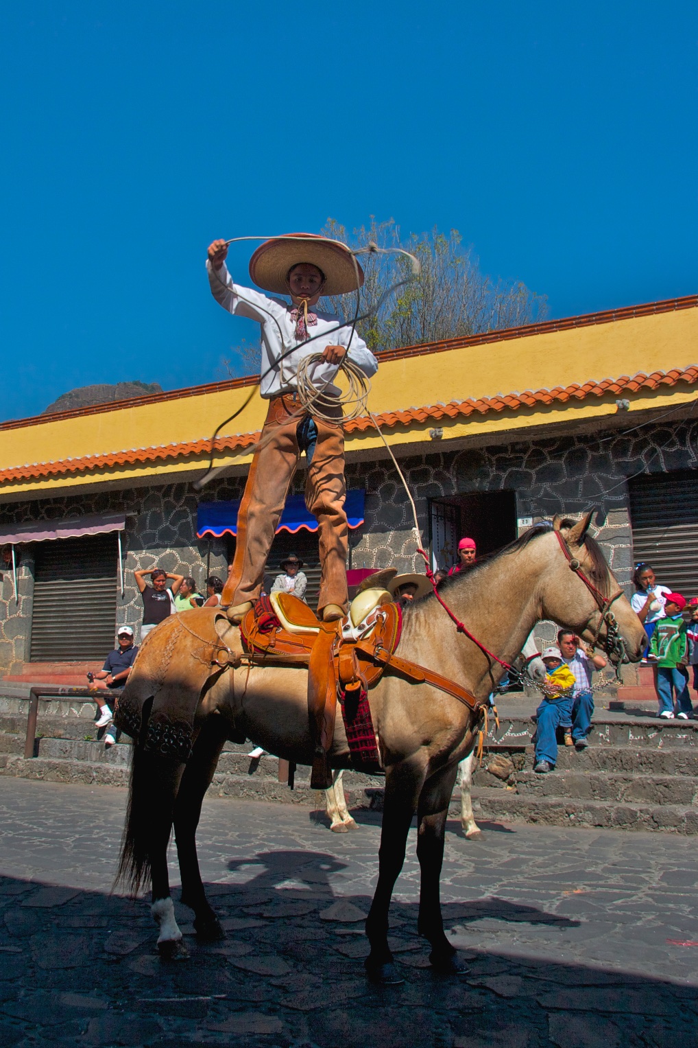 Horseback charro on Revolution day. Tepoztlán, Mexico.