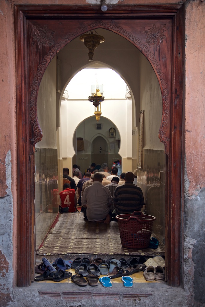 Afternoon prayers. Marrakesh, Morocco.
