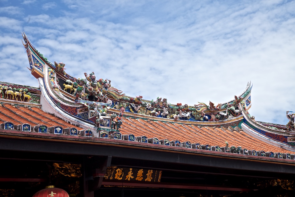 Religious roof adornment in Malacca, Malaysia.
