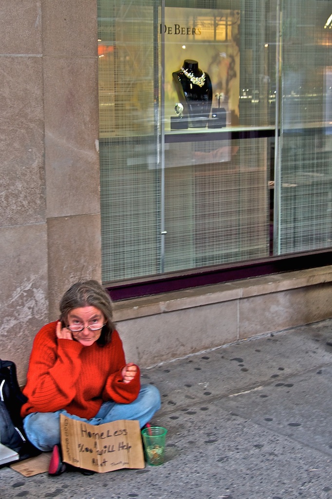 Surely a prime spot asking the rich for alms. Manhattan, New York, USA.