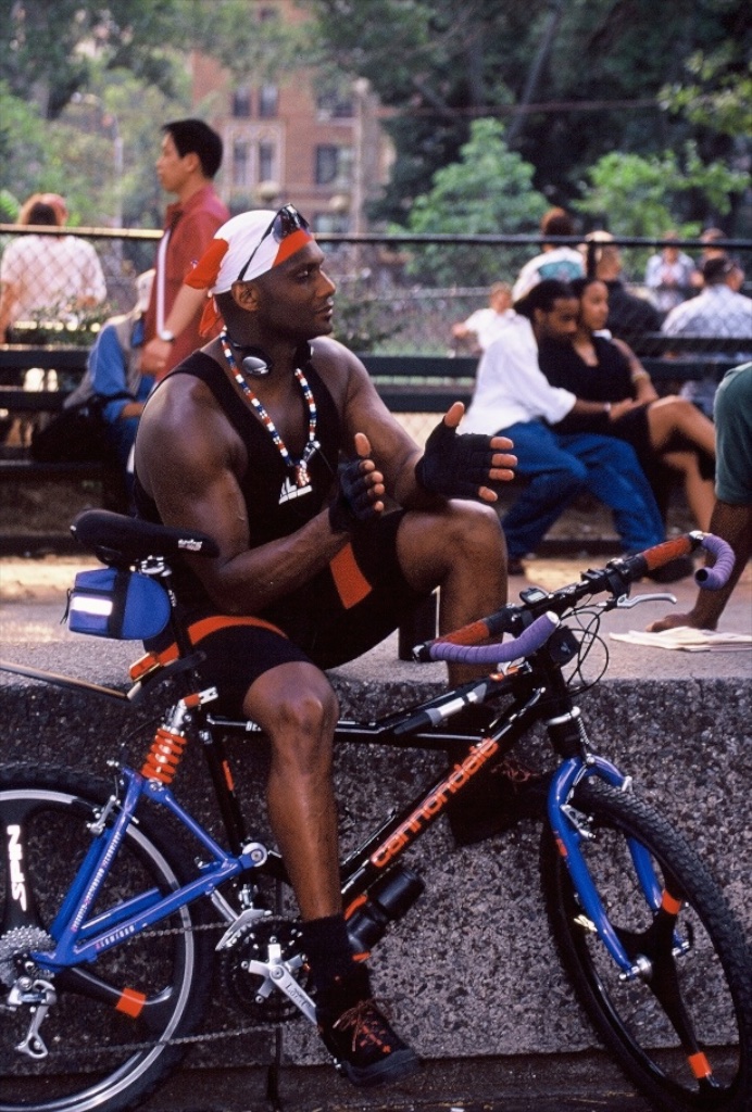 Bicycle rider in Washington Square. New York, USA.