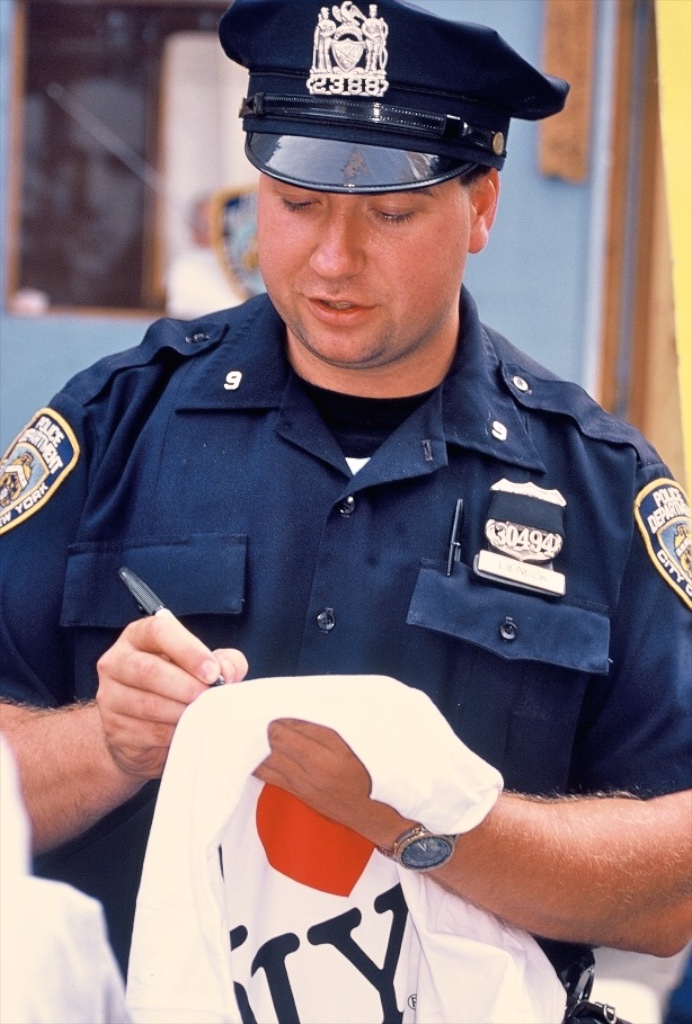 Signing autographs in the wake of 9/11, 2001. New York, USA.