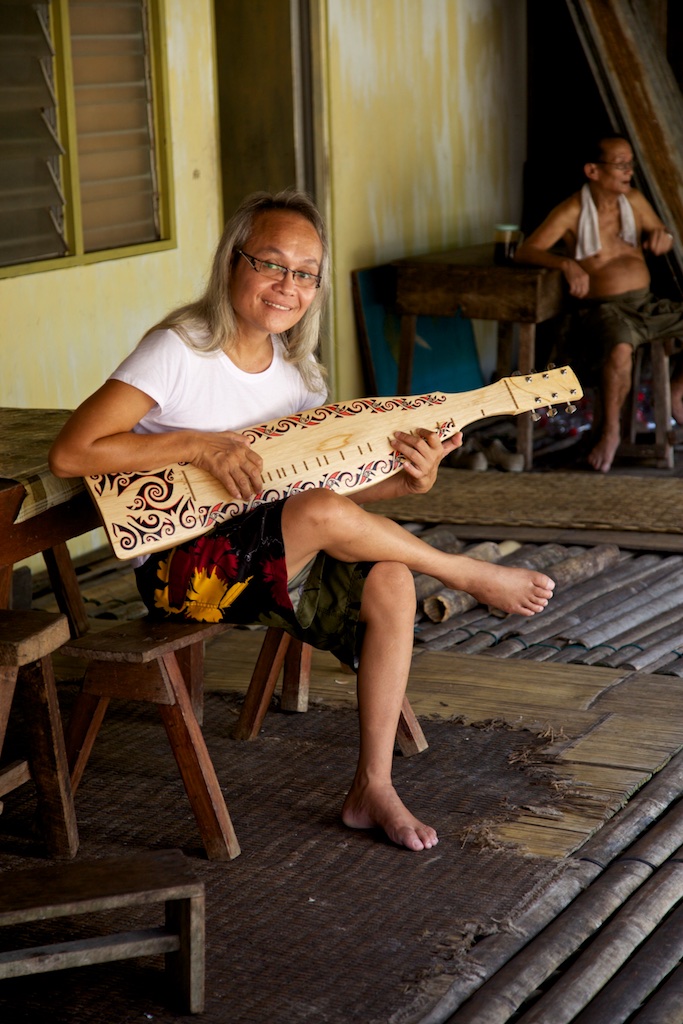 Musician. Borneo, Indonesia.