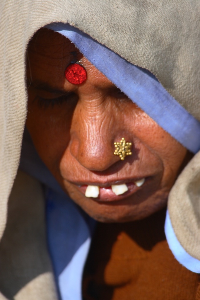 The blue ribbon gold star lady. India.