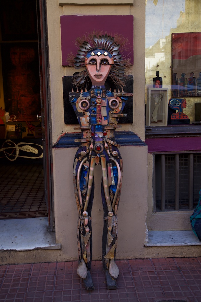 Well-sculpted bar waitress.