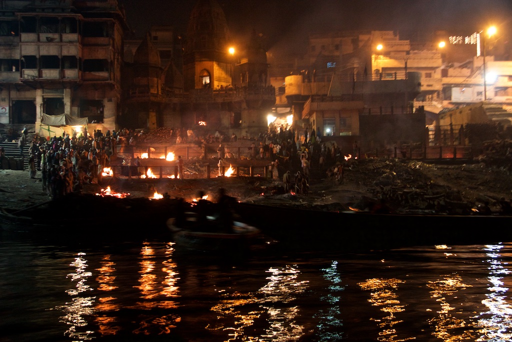The night shift cremation task force by the Ganges River, India.