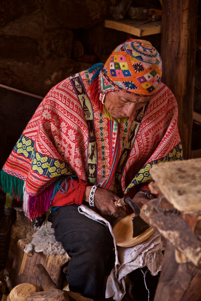 Indigenous carpenter, Awana Kancha, Peru.