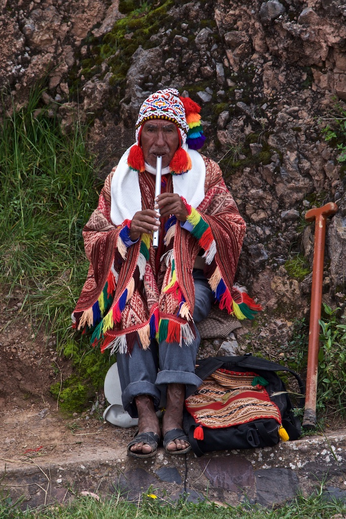 Flute player. Quengo, Peru.